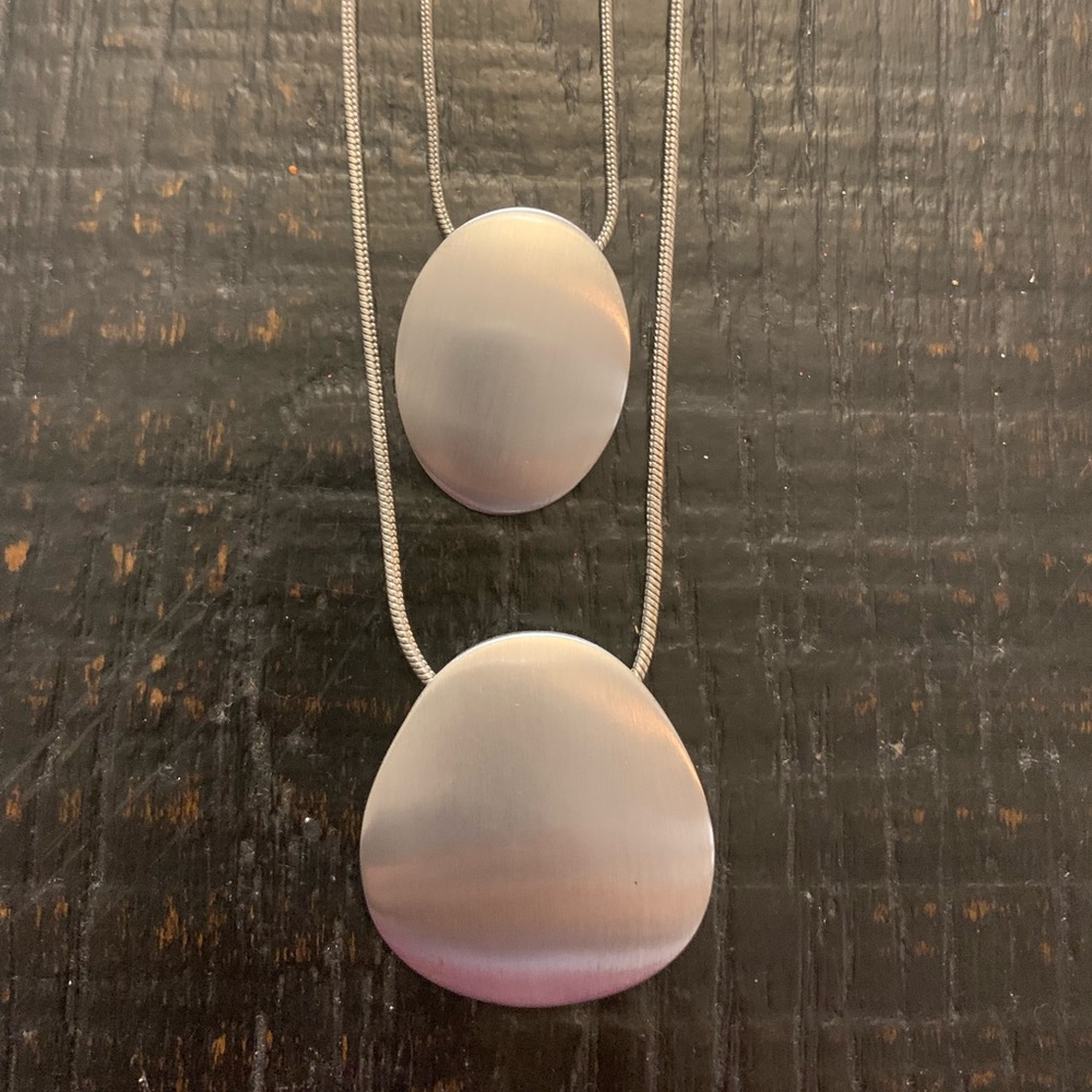 Silver double necklace with two charms